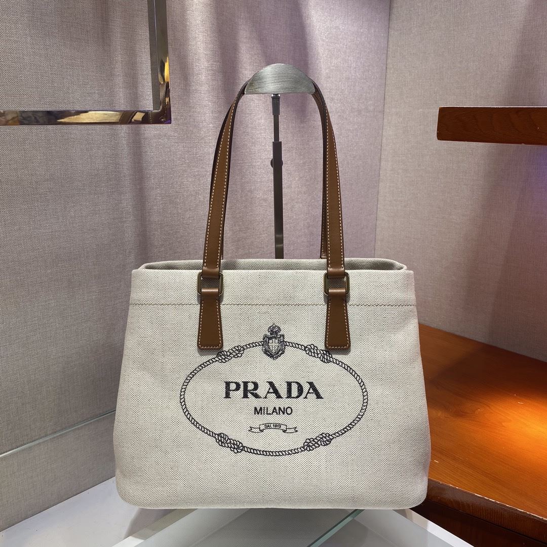 Pra*a top handle bags